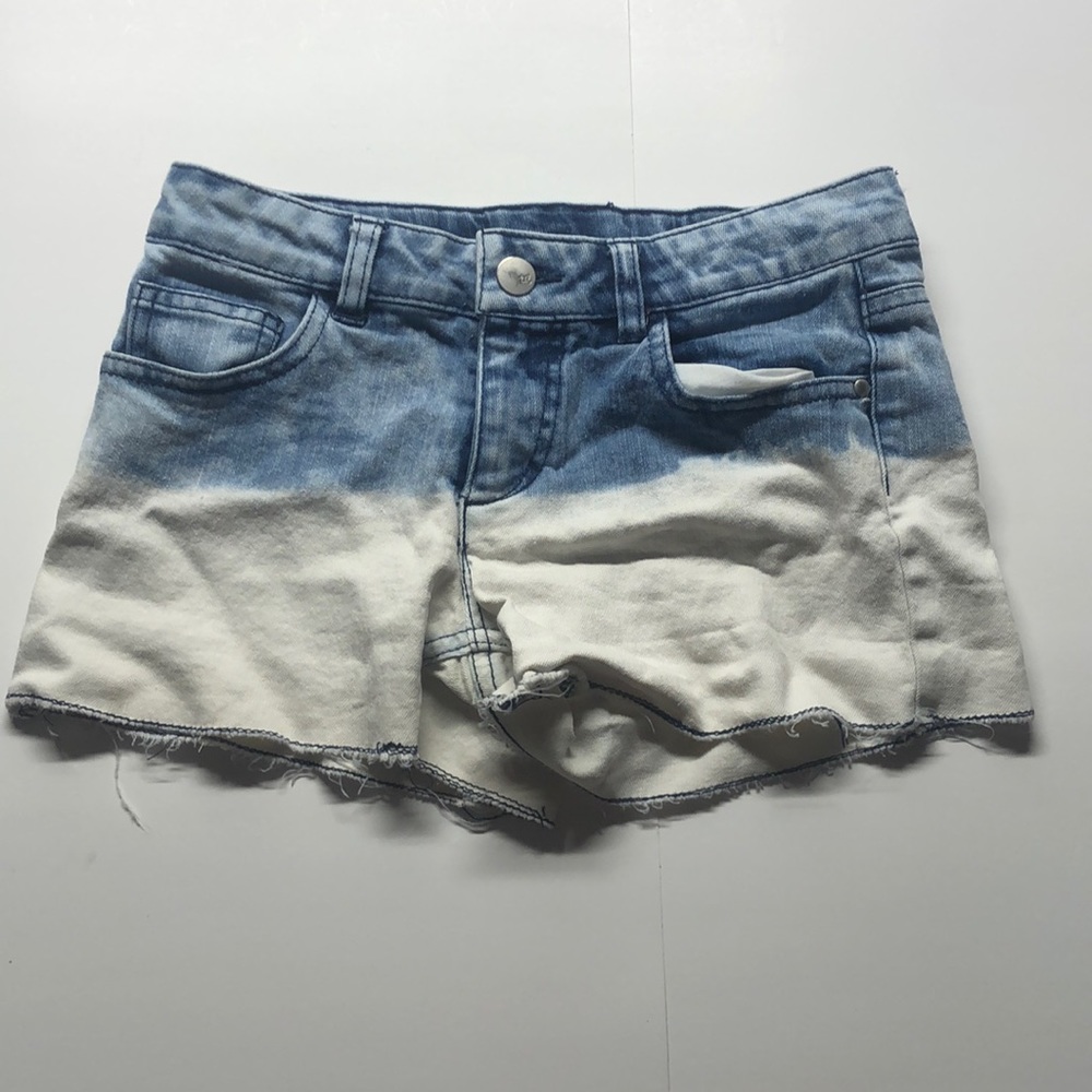 Total Girl Size 12 Blue and White ripped Jean shorts.